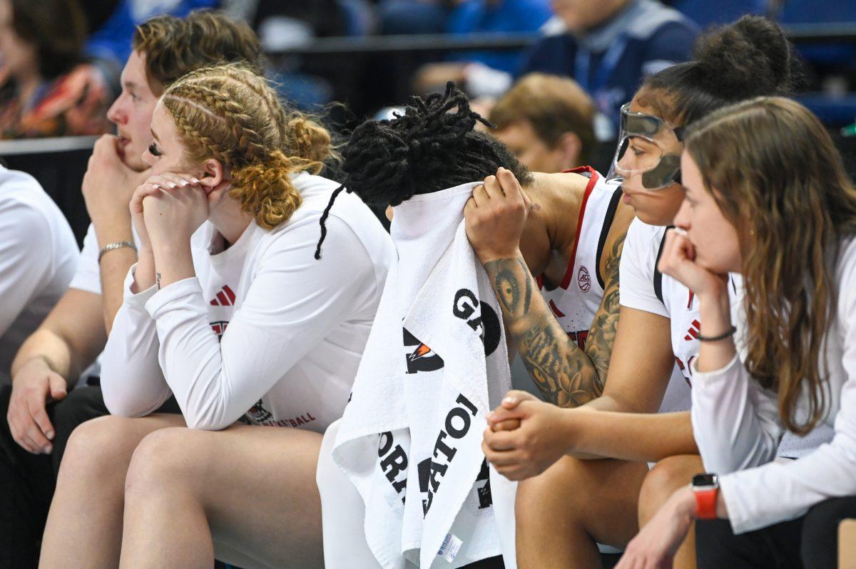 Senior guard Aziaha James hangs her head during the championship game of the ACC Tournament against Duke in Greensboro Coliseum on Friday, March 7, 2025. James led the team in points, scoring 18 overall. The Wolfpack lost to the Blue Devils 76-62.