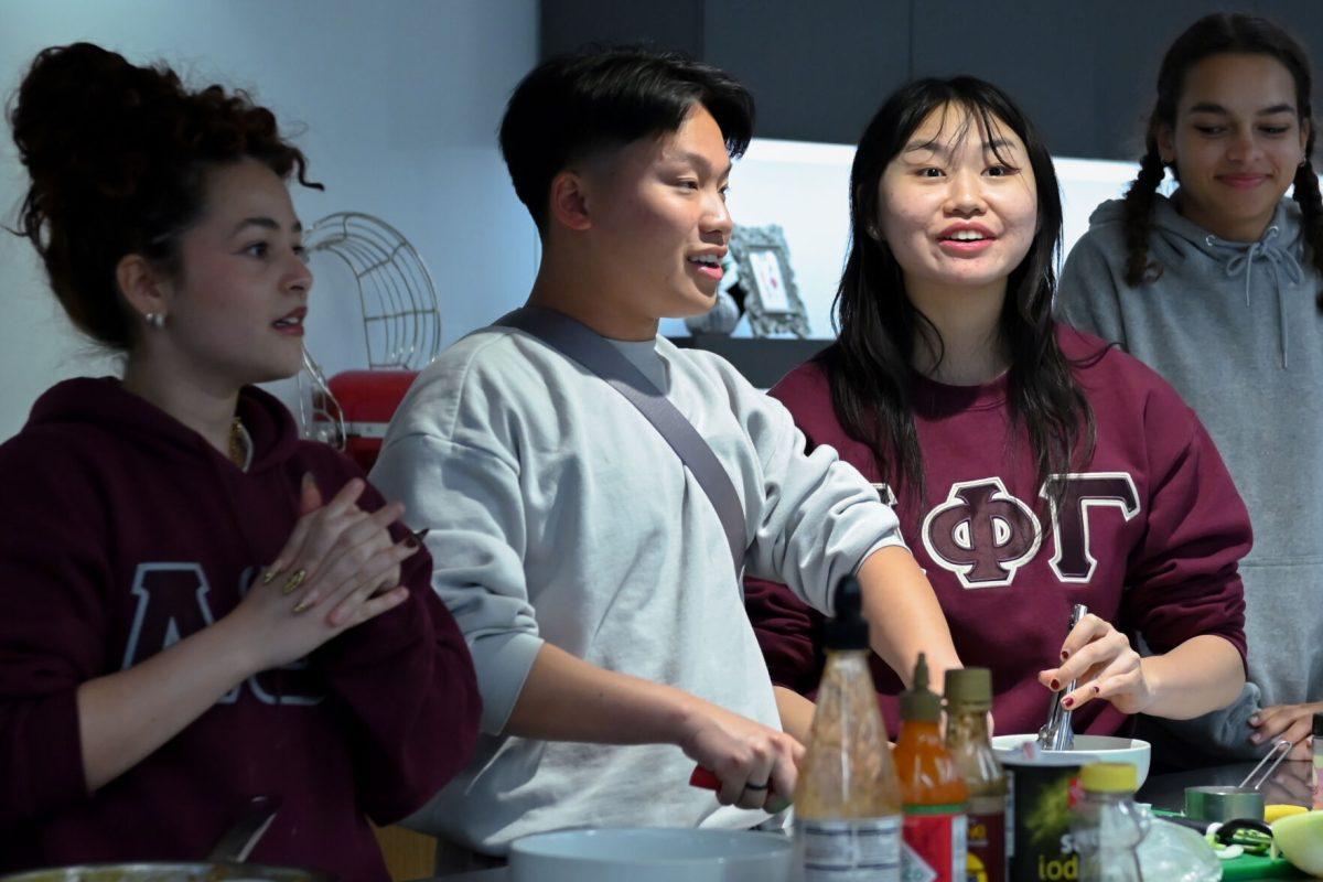 Team two reacts to receiving a five minute time deduction after answering a trivia question incorrectly during the MGC Chopped: Cooking Competiton at Carmichael Gym on Wednesday, March 26, 2025. The teams were faced with a surprise trivia question round in the middle of the challenge.