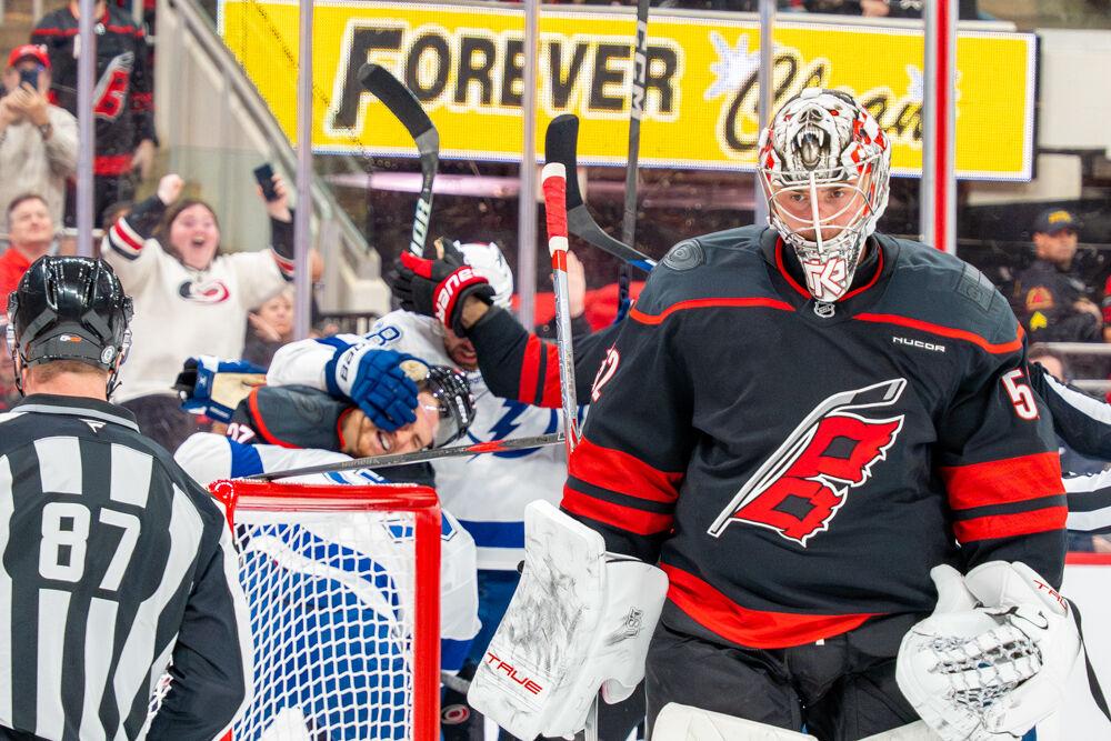 Goalkeeper Pyotr Kochetkov skates away from a fight during the game against the Tampa Bay Lightning at the Lenovo Center on Tuesday, March 11, 2025. Kochetkov had 24 saves. The Hurricanes beat the Lightning 4-1.