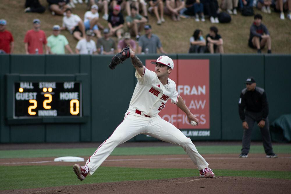 Sophomore pitcher Cooper Consiglio winds up a pitch during the game against USC-Upstate on Doak Field at Dail Park on Tuesday, March 25, 2025. The game ended in the eighth inning due to the mercy rule. The Wolfpack lost to the Spartans 15-5.