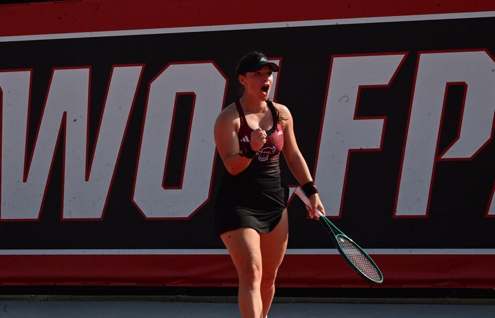 Freshman Michaela Laki celebrates scoring a point&#160;during the match against Clemson at J.W. Isenhour Tennis Center on Friday, March 28, 2025. NC State won the match 4-0.