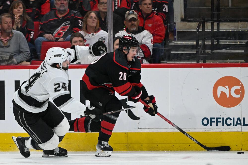 Forward Sebastian Aho fights for the puck during the game against the Los Angeles Kings at the Lenovo Center on Saturday, Feb. 1, 2025. Aho had two shots on goal. The Hurricanes fell to the Kings 4-2.