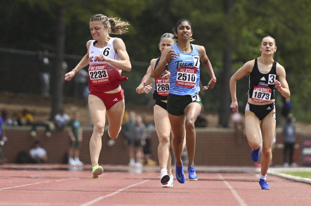 Sophomore distance runner Kate Putman pushes herself as she approaches the finish line of the 800m during the Raleigh Relays track meet at the Derr Track and Field Facility on Saturday, March 29, 2025. Putman ran the event in 2:08, earning herself a personal best.