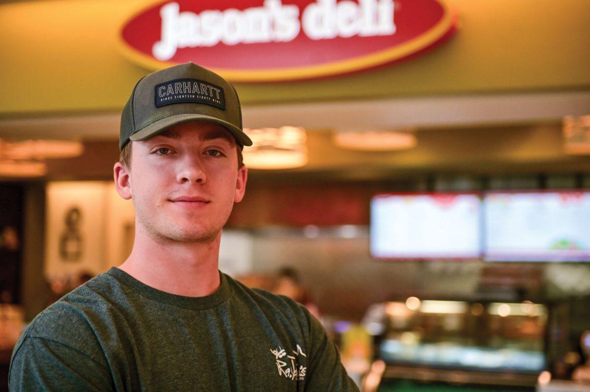 Alex Woody, a third year studying civil engineering, poses for a portrait in front of Jason's Deli in Talley Student Union on Monday, March 24, 2025. Woody was approached by members of Internation Christian Church in this area of Talley Student Union.