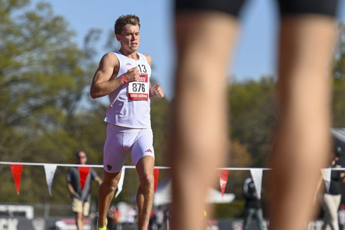 Distance runner Patrick Tuohy crosses the finish line after running the 1500m during the Raleigh Relays track meet at the Derr Track and Field Facility on Thursday, March 27, 2025. Tuohy finished with a time of 4:02.36, earning him a new personal best in the process.