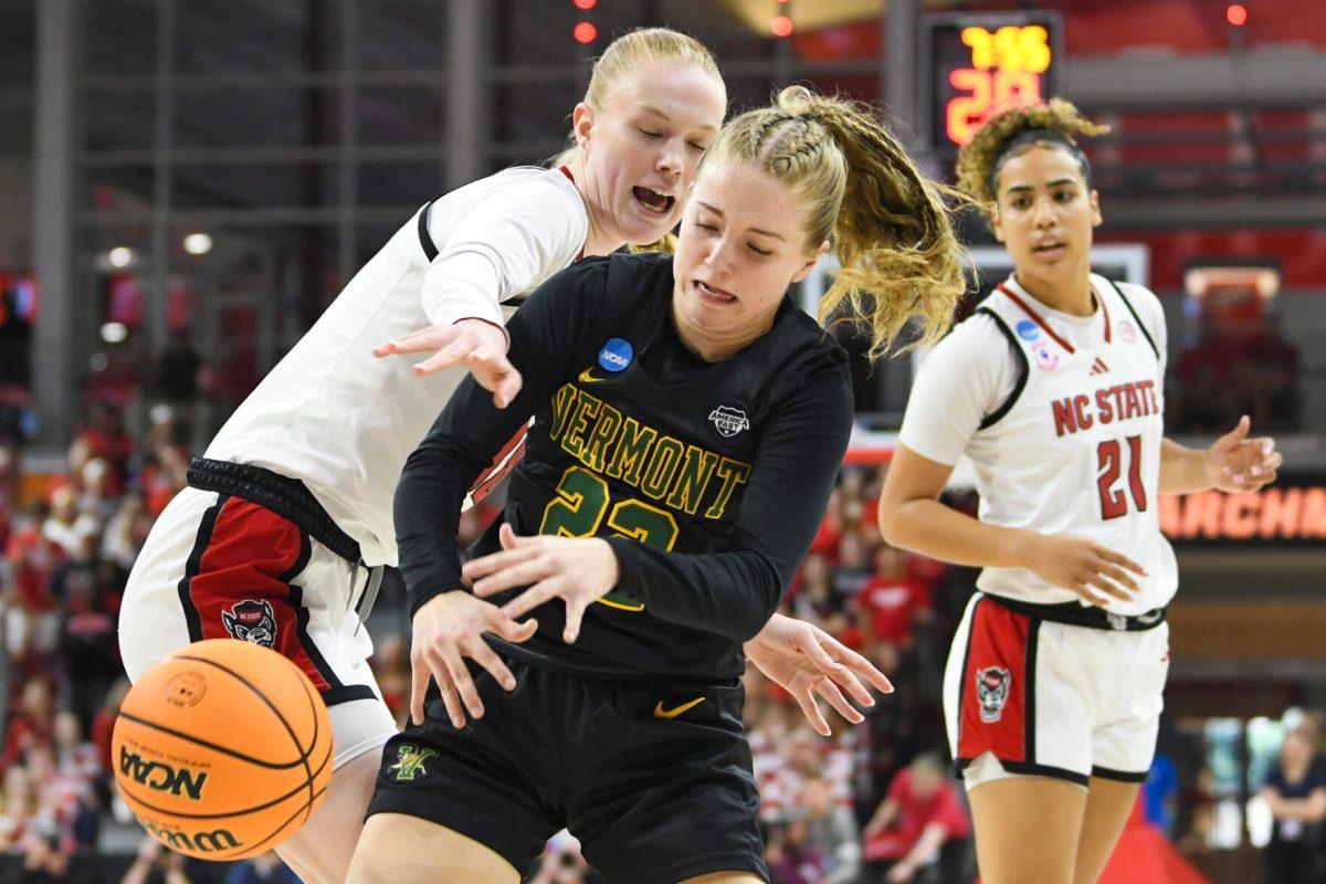 Freshman forward Tilda Trygger attempts to gain possession of the ball during the first round game of the NCAA Tournament against Vermont in Reynolds Coliseum on Saturday, March 22, 2025. Trygger made seven rebounds and two blocks, on top of scoring eight points. NC State won the game 75-55.