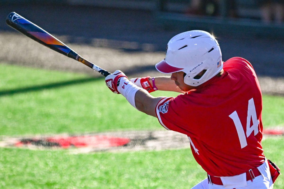 Freshman out fielder Ty Head hits the ball during the game against Canisius at Doak Field at Dail Park on Feb. 28, 2025. Head earned five RBI's including a grand slam. NC State beat Canisius 10-2 in the first game of the series.