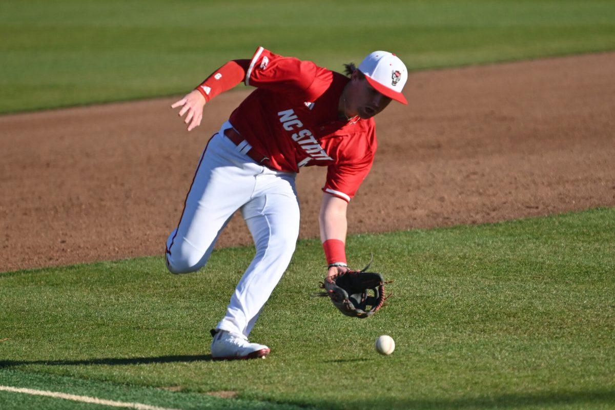 Junior infielder Matt Heavner scoops the ground ball and makes the play at first during NC State's game against the Canisius Golden Griffins on Doak Field at Dail Park on Friday, Feb. 28, 2025. The Wolfpack beat the Golden Griffins 10-2 to take the first game of the series.