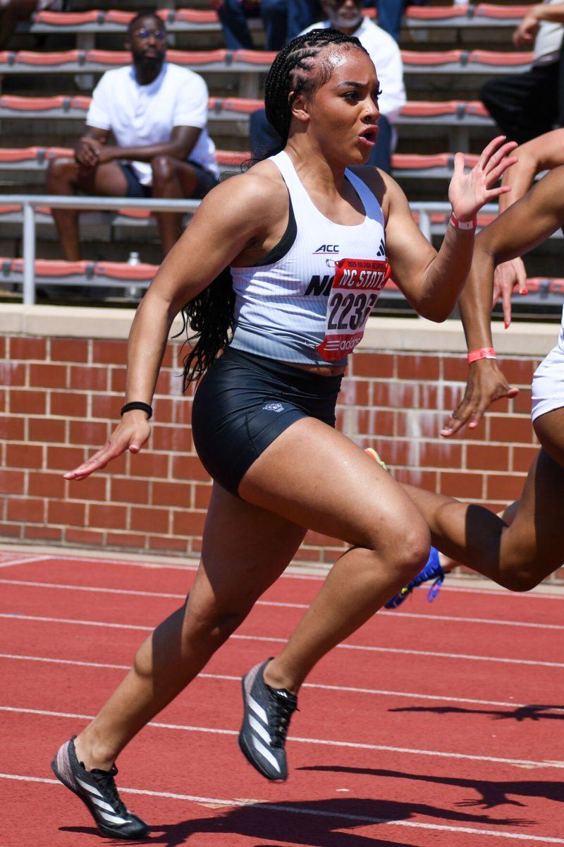 Freshman sprinter Jada Ray sprints down the track during the Raleigh Relays track meet at the Derr Track and Field Facility on Friday, March 28, 2025. Ray finished fifth in her heat of the women's 100m with a time of 12.01, marking a personal best.