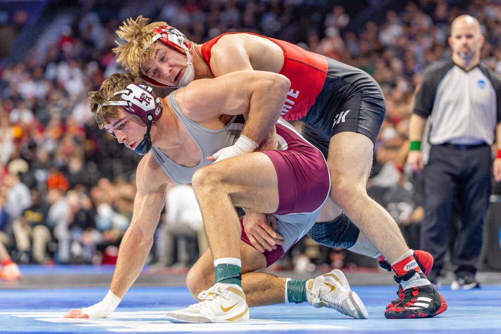 Senior Ed Scott maintains back position during the NCAA Wrestling Championship Tournament in the Wells Fargo Center on Thursday, March 20, 2025.&#160;The Wolfpack placed eighth in the tournament with 46.5 points.