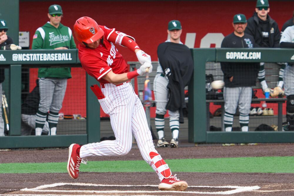 Freshman infielder Ryder Woodson takes a swing at the ball during the game against Wright State on Doak Field at Dail Park&#160;on Friday, March 7, 2025. Woodson scored one of the six runs for the Wolfpack. The Wolfpack won against the Raiders 6-4.
