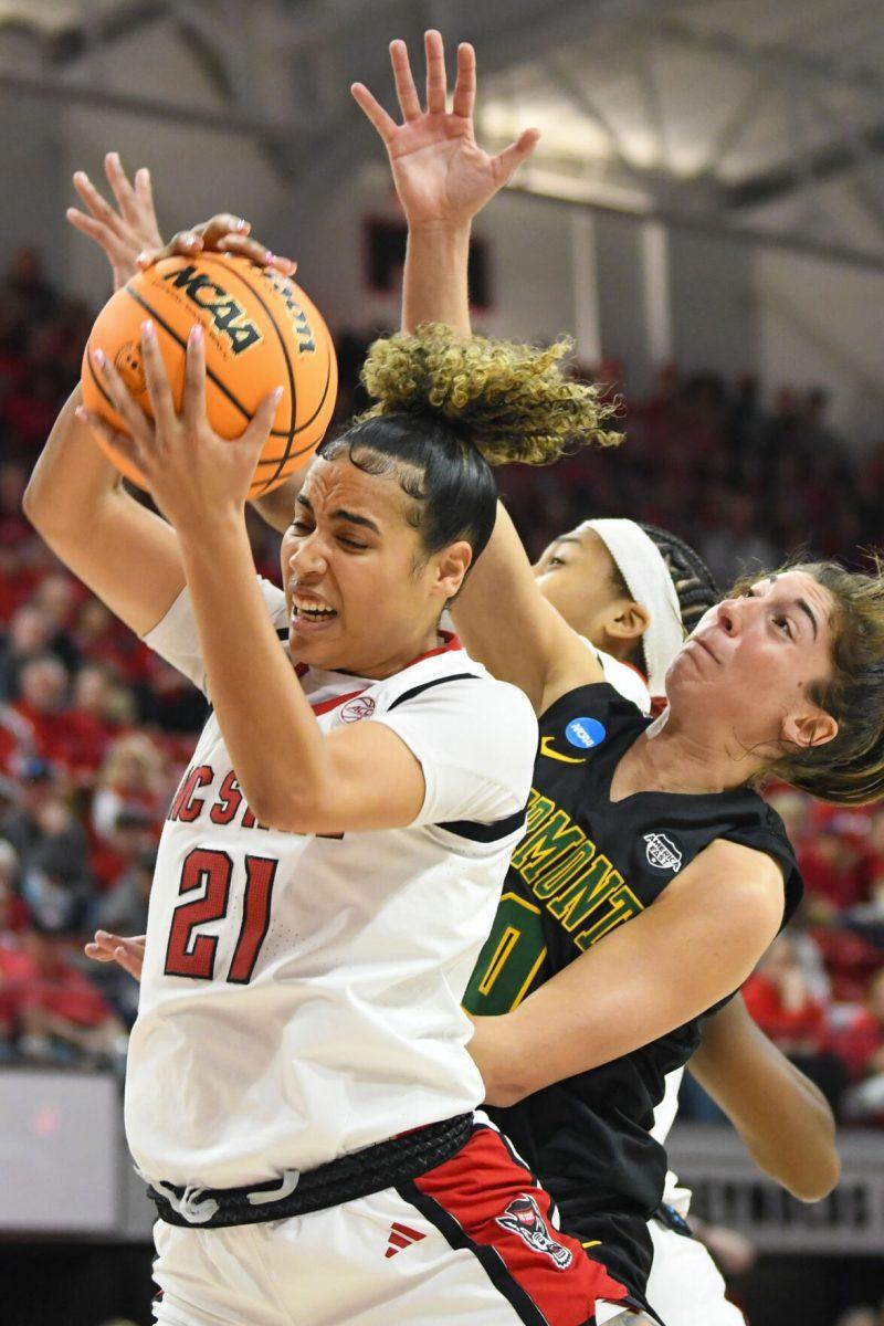 Graduate guard Madison Hayes makes a rebound during the first round game of the NCAA Tournament against Vermont in Reynolds Coliseum on Saturday, March 22, 2025. Hayes made 12 rebounds, one steal and one block, on top of scoring nine points. The Wolfpack beat the Catamounts 75-55.