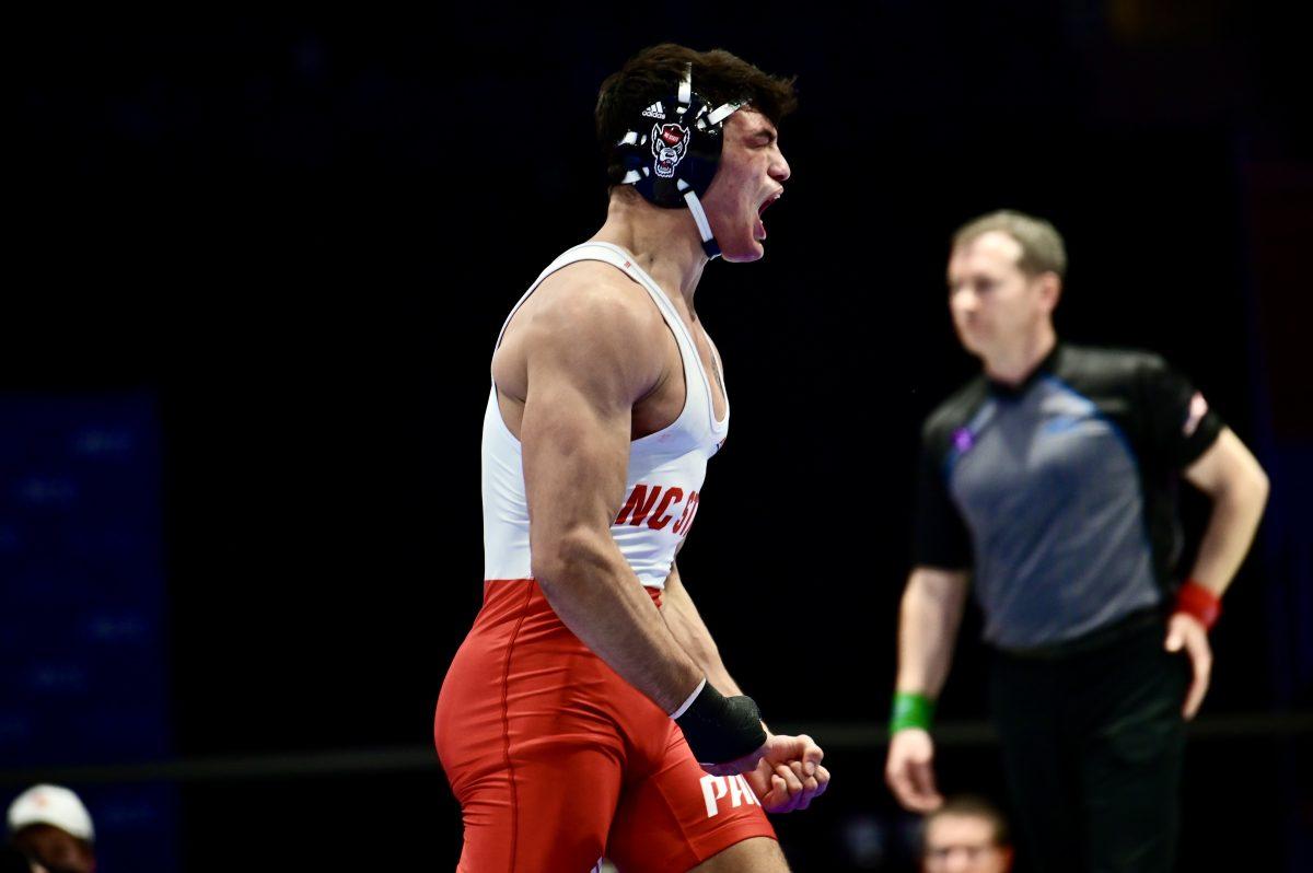Redshirt sophomore Matty Singleton shouts after winning the finals match for the 174 weight class during the ACC Championship in Cameron Indoor Stadium on Sunday, March 9, 2025. Singleton won the bout 5-2, marking his first time as an ACC Champion.