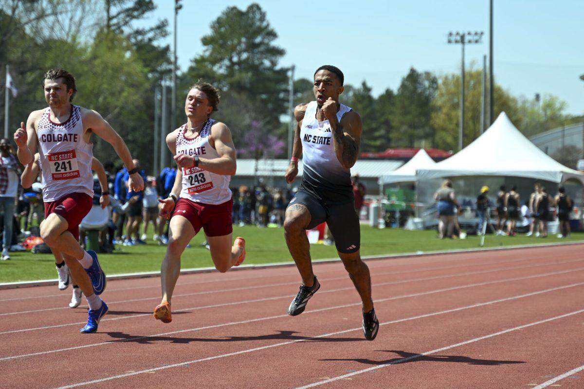 Sophomore hurdler Kyron Parker runs down the track during the Raleigh Relays track meet at the Derr Track and Field Facility on Friday, March 28, 2025. Parker ran a 11.35 in the 100m dash.