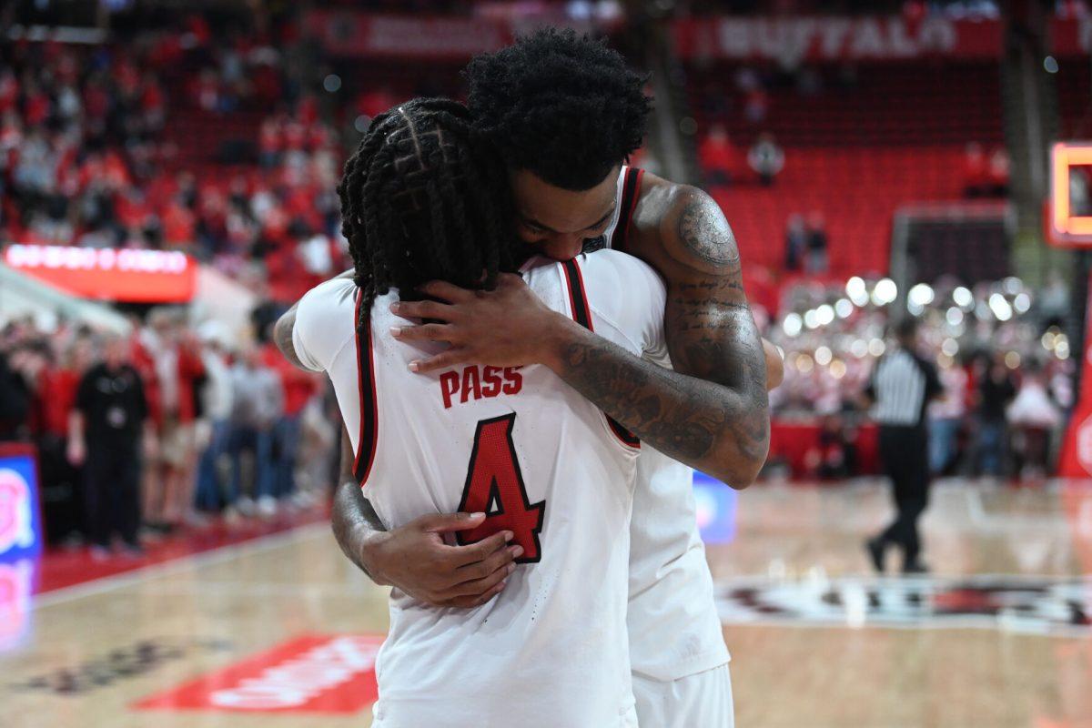 Senior guard Breon Pass and senior guard/forward Dontrez Styles hug after the match against Pitt in the Lenovo Center on Wednesday, March 5, 2025. NC State had 32 rebounds total. The Wolfpack beat the Panthers 71-63.