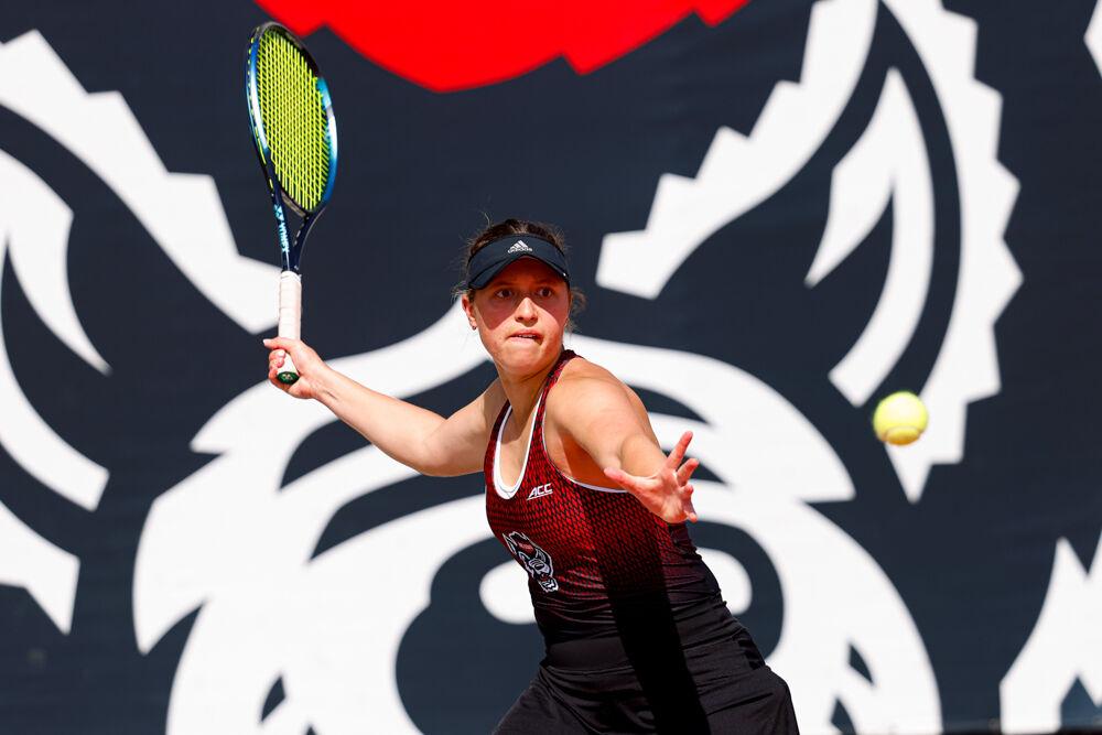 Junior Anna Zyryanova awaits the arrival of the ball during her singles game against Clemson at J.W. Isenhour Tennis Center on Friday, March 28, 2025. Zyryanova won her singles match 6-2, 6-3. NC State won the match 4-0.