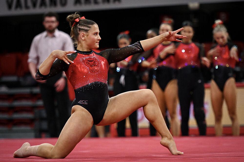 Sophomore Elle Hadrick poses during her floor routine during the meet against Ohio State in Reynolds Coliseum on Friday, March 7, 2025. Hadrick scored 9.900 in the floor exercise. NC State beat Ohio State 197.000-196.325.