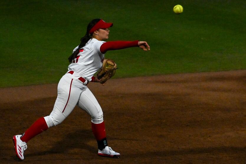 Freshman infielder Kendall Simmers throws the ball during the game against UNC-Wilmington in Dail Softball Stadium on Saturday, March 1, 2025. Simmers scored two runs. The Wolfpack defeated the Seahawks 14-1.