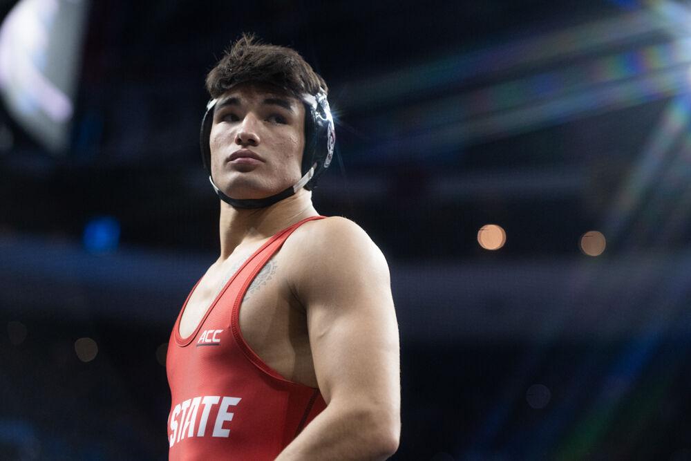 Redshirt sophomore Matty Singleton prepares for his first bout during the NCAA Wrestling Championship Tournament in Wells Fargo Center on Thursday, March 20, 2025. Singleton placed seventh for the 174 pound weight class. NC State placed eighth overall with 46.5 points.