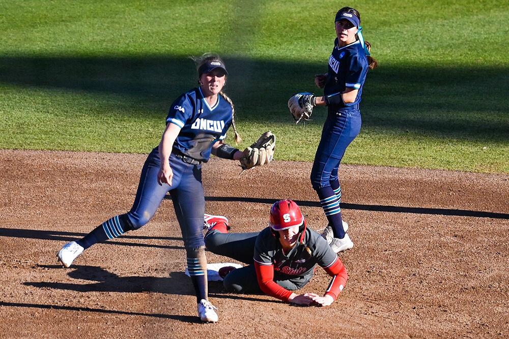 Redshirt junior infielder Michele Tarpey slides to second base during the game against UNC-Wilmington at Dail Softball Stadium on Feb. 28, 2025. Tarpey hit twice during the game. NC State lost to UNC-Wilmington 5-4.