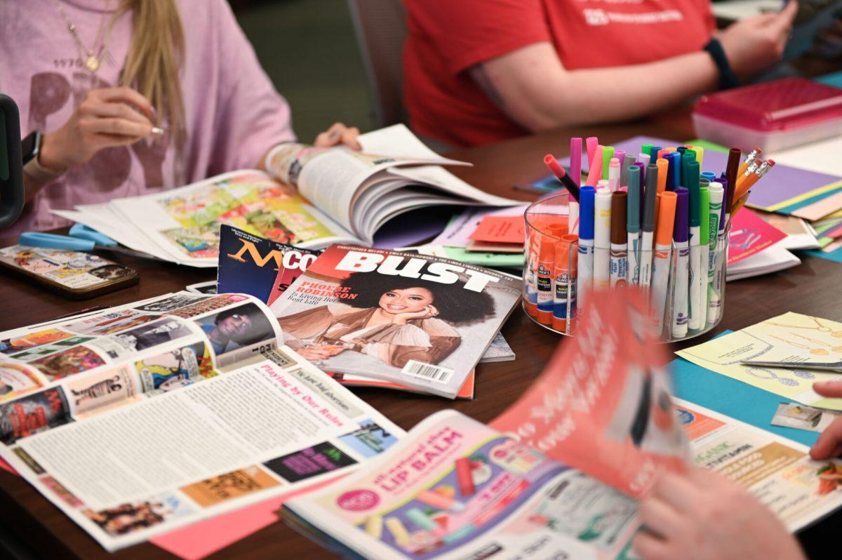 Magazine materials sit in the Women's Center on Tuesday, March 25, 2025.&#160;The Women's Center's hosted the event to examine the role of scrapbooks and zines in feminist and womanist movements.