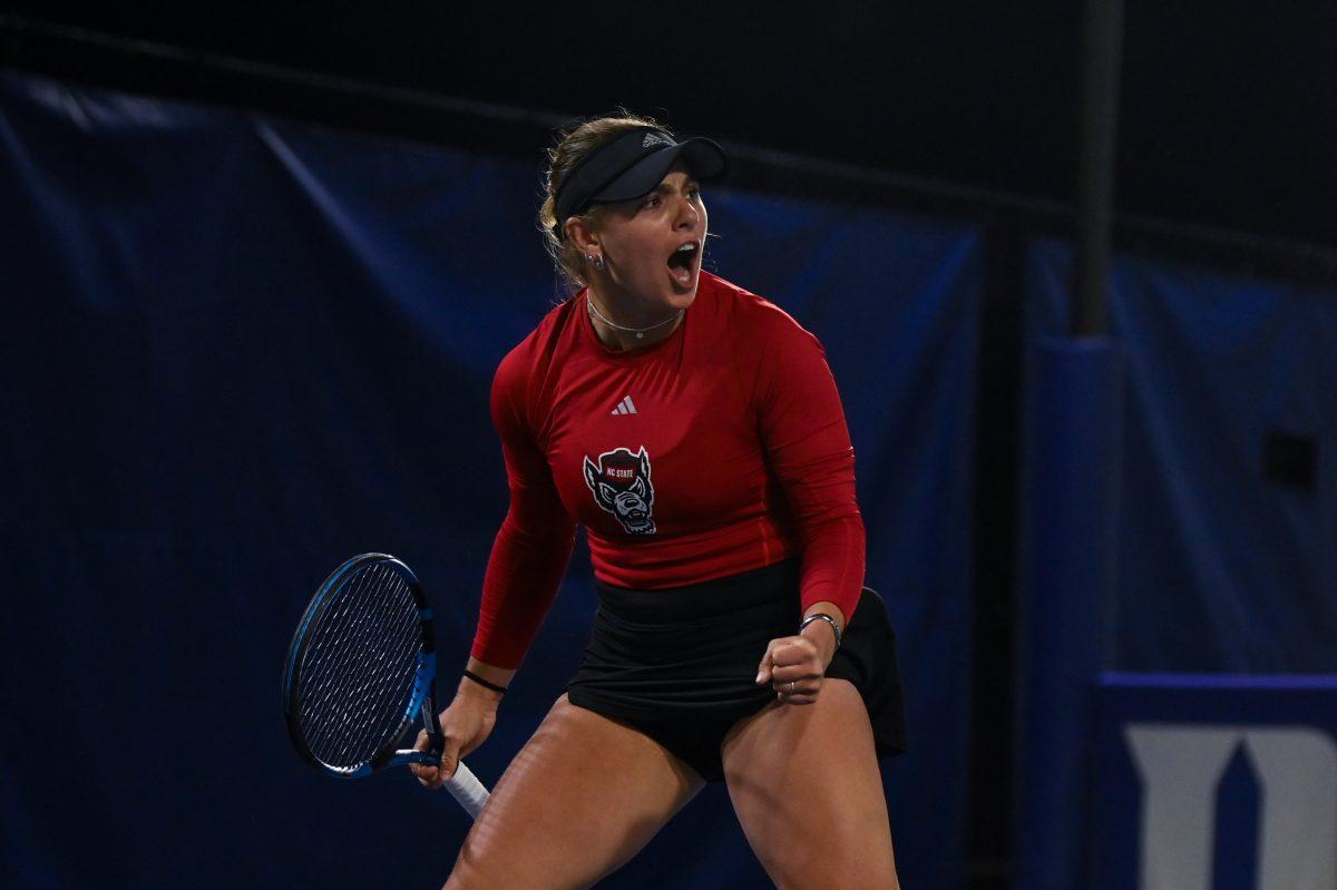 Sophomore Gabriella Broadfoot yells in celebration of a point during the match against Duke at Ambler Tennis Stadium on Friday, March 21, 2025. Broadfoot won her singles match 2-1. NC State fell to Duke 3-4.