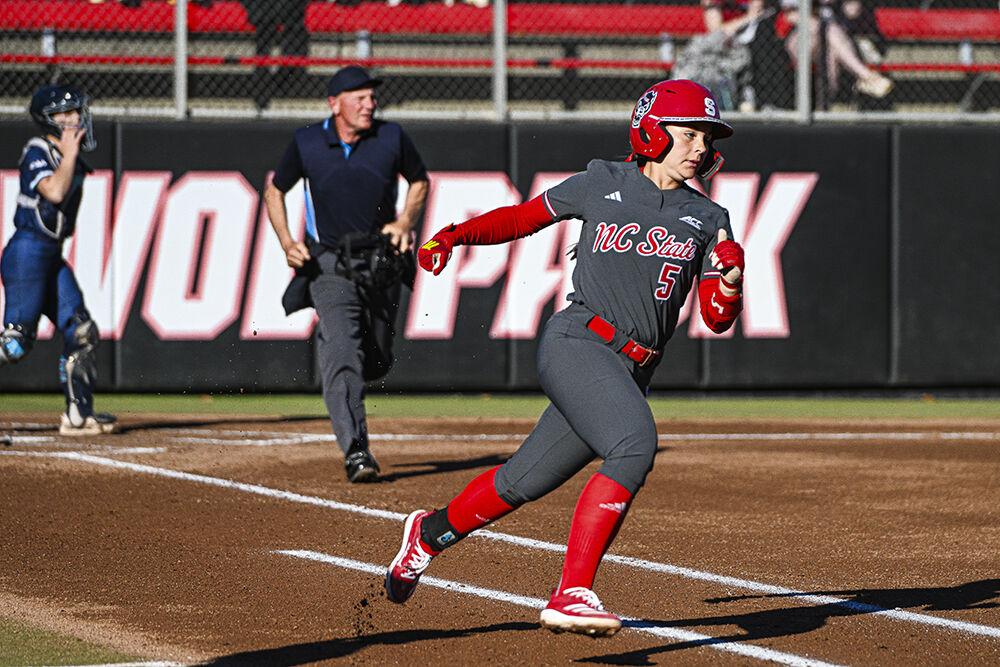Freshman infielder Kendall Simmers runs to first base during the game against UNC-Wilmington at Dail Softball Stadium on Friday, Feb. 28, 2025. Simmers had one run and one hit. NC State lost to UNC-Wilmington 5-4.