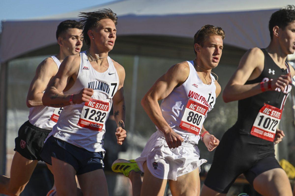 Graduate distance runner Brett Gardner finishes his first lap of the 1500m during the Raleigh Relays track meet at the Derr Track and Field Facility on Thursday, March 27, 2025. Gardner earned a personal best with a time of 3:42.18.