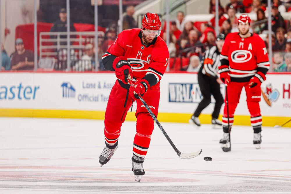 Center Jordan Staal takes the puck up the ice during the game against the Nashville Predators at the Lenovo Center on Tuesday, March 25, 2025. Staal attempted one shot on the goal. The Hurricanes lost 3-1.