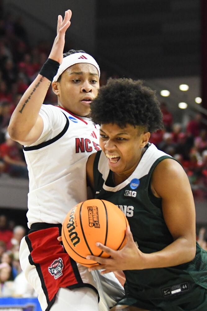 Sophomore guard Zoe Brooks defends the basket during the second round game of the NCAA Tournament against Michigan State in Reynolds Coliseum on Monday, March 24, 2025. Brooks made four rebounds, four assists and one steal. NC State won the game 83-49.