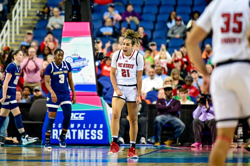Graduate guard Madison Hayes yells after scoring a 3-pointer during the quarterfinals game of the ACC tournament against Georgia Tech in Greensboro Coliseum on Friday, March 7, 2025. Hayes scored nine points and made six rebounds. NC State beat Georgia Tech 73-72.