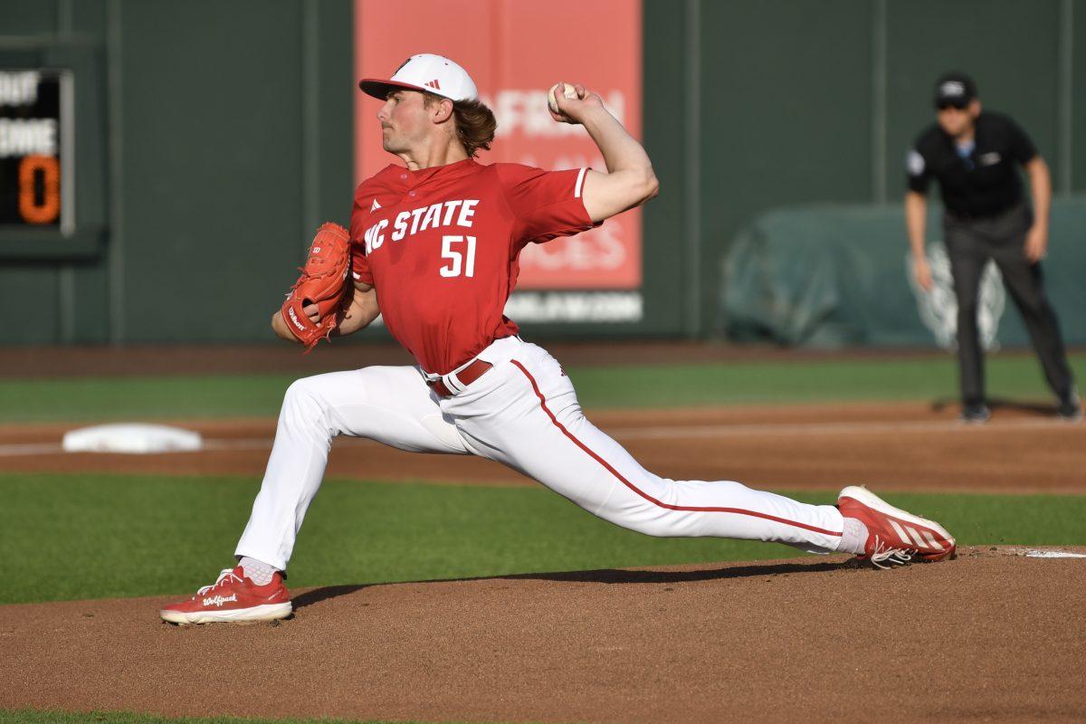 Junior starting pitcher Dominic Fritton pitches during the Wolfpack's home game against the Virginia Cavaliers on Doak Field at Dail Park on Friday, April 4, 2025. Fritton gave up five runs on 10 hits and recorded three strike outs on 5.2 innings pitched. The Cavaliers beat the Wolfpack 8-6.