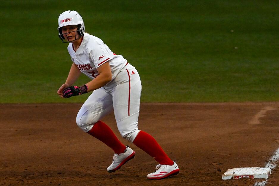 Junior catcher Hannah Church runs from first base to second while eyeing the pitch during the game against UNC-Wilmington in Dail Softball Stadium on Saturday, March 1, 2025. Church was walked twice. NC State beat UNC-Wilmington 14-1.