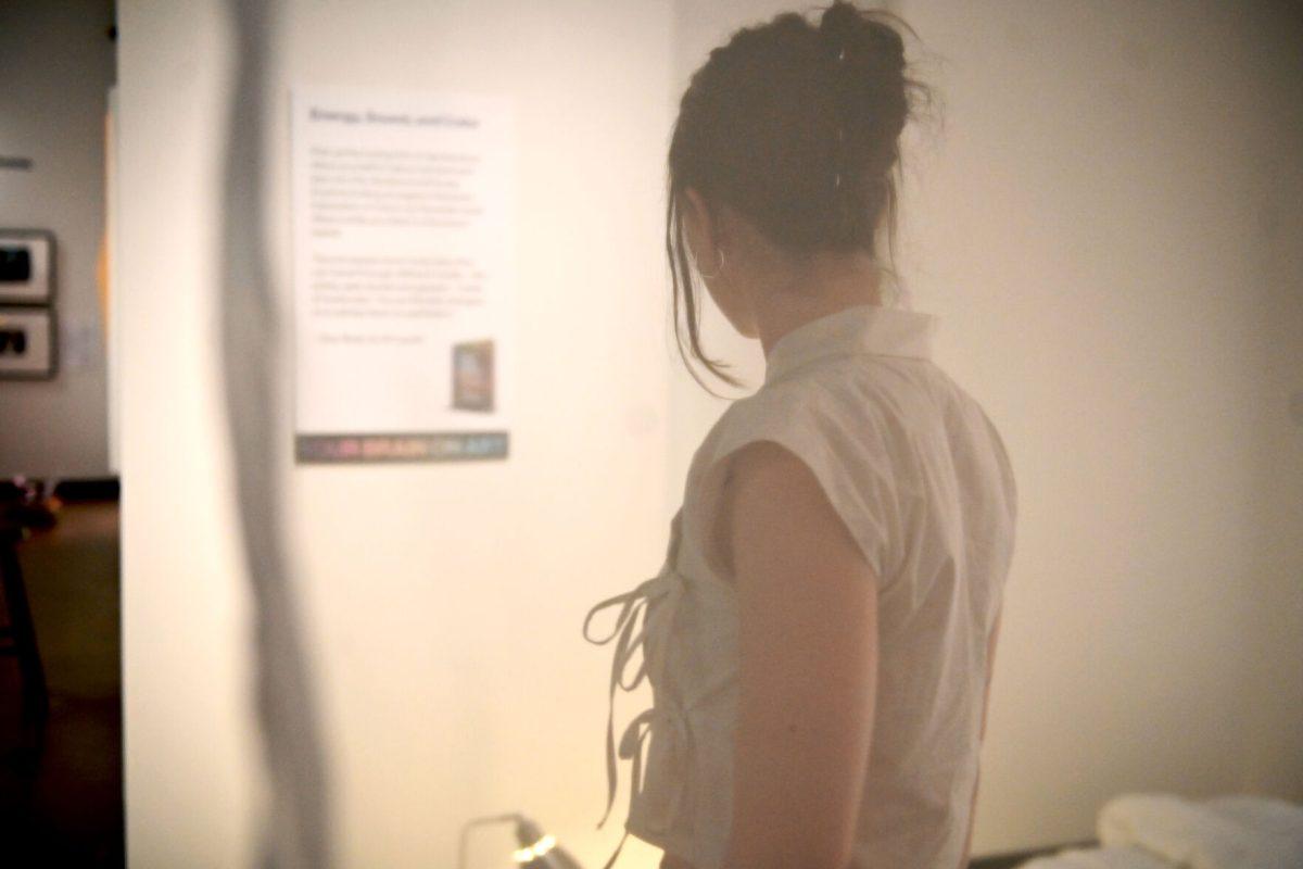 AK Stipanov, a fourth-year studying environmental design in architecture, models one of the three pieces that make up &#8220;Palingenesis&#8221; by Elle Newkirk during the Art2Wear: Revive! show at the Gregg Museum of Art and Design on Thursday, April 24, 2025. Newkirk&#8217;s design explores the experience of small deaths and rebirths that people experience as they grow and learn throughout their lifetime. &#8220;Palingenesis&#8221; is also an exploration of the designer&#8217;s Korean roots.