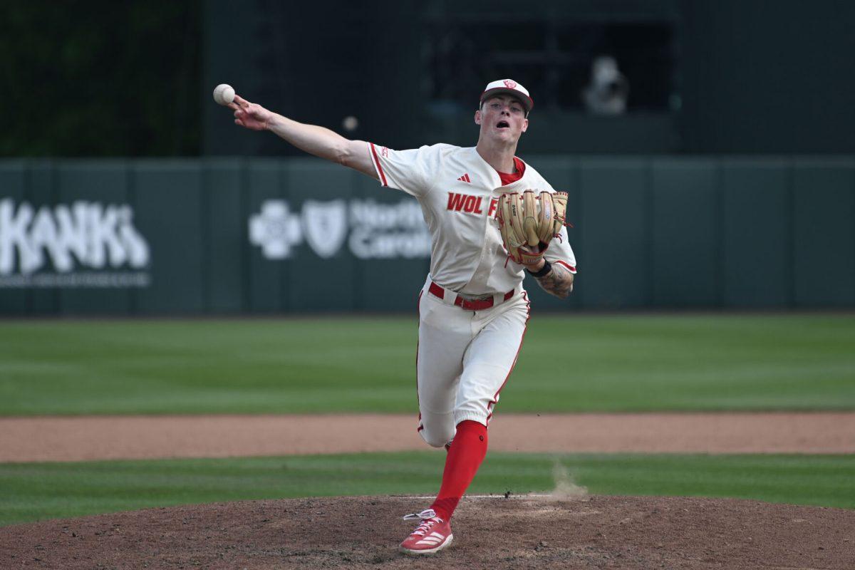 Sophomore pitcher Jacob Dudan pitches against the Clemson Tigers at Doak Field at Dail Park on Saturday, April 26, 2025. Dudan struck out all three batters faced in the ninth inning in relief of sophomore starting pitcher Ryan Marohn. The Wolfpack beat the number two ranked Tigers 4-1 to complete the sweep and continue a seven game and four series winning streak.
