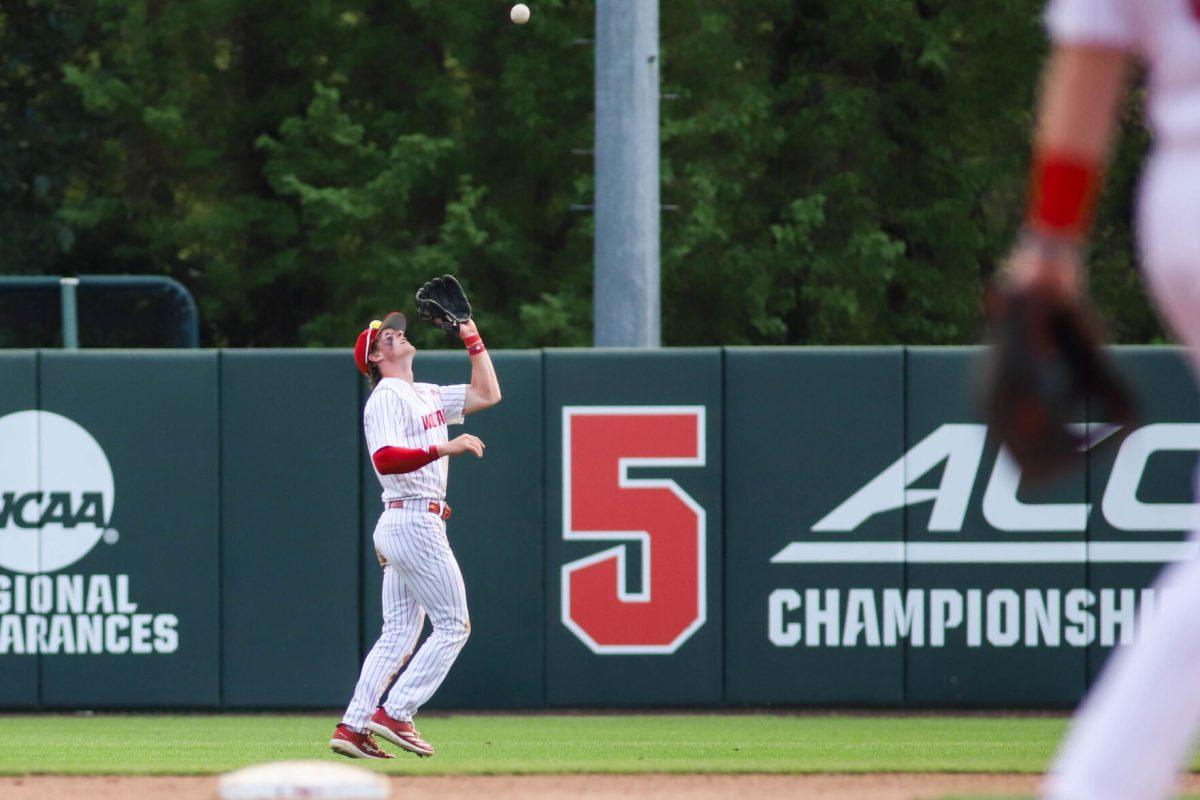Sophomore infielder Luke Nixon catches the ball during the game against Virginia at Doak Field at Dail Park on Saturday, April 5, 2025. The Wolfpack beat the Cavaliers 9-2.