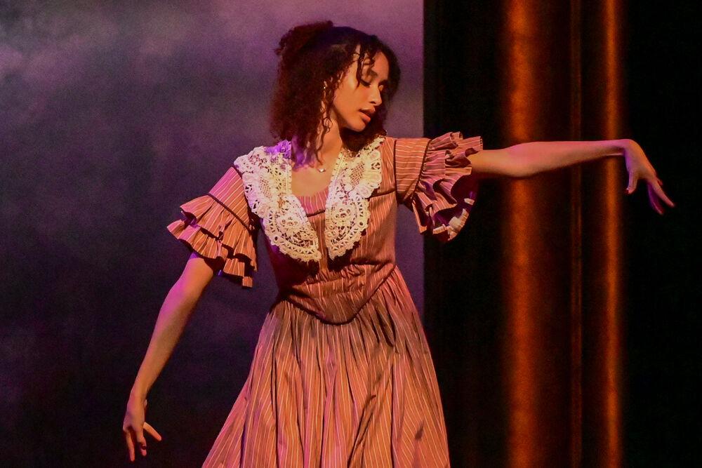 Jayla Freeman, as Cathy, dances during the dress rehearsal performance of "You on the Moors" at Frank Thompson Hall on Wednesday, April 2, 2025. "You on the Moors Now" reimagines classic literary heroines as they explore themes of love, betrayal and independence.