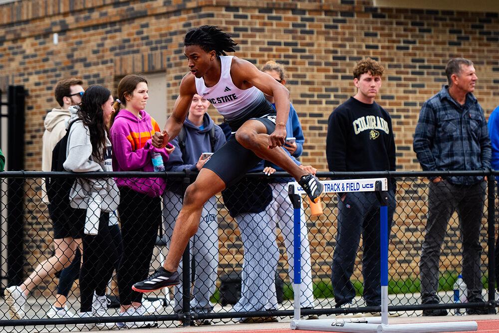 Freshman sprinter James Coleman jumps over the hurdle in the 400m hurdles event during the Duke Invitational in the Morris Williams Stadium on Saturday, April 13, 2025. Coleman placed first in his heat and eleventh overall with a time of 53.00.