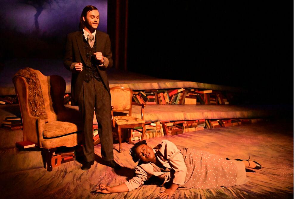Dasha Royal, as Caroline, cries on the floor during the dress rehearsal performance of "You on the Moors" at Frank Thompson Hall on Wednesday, April 2, 2025. "You on the Moors Now" reimagines classic literary heroines as they explore themes of love, betrayal and independence.