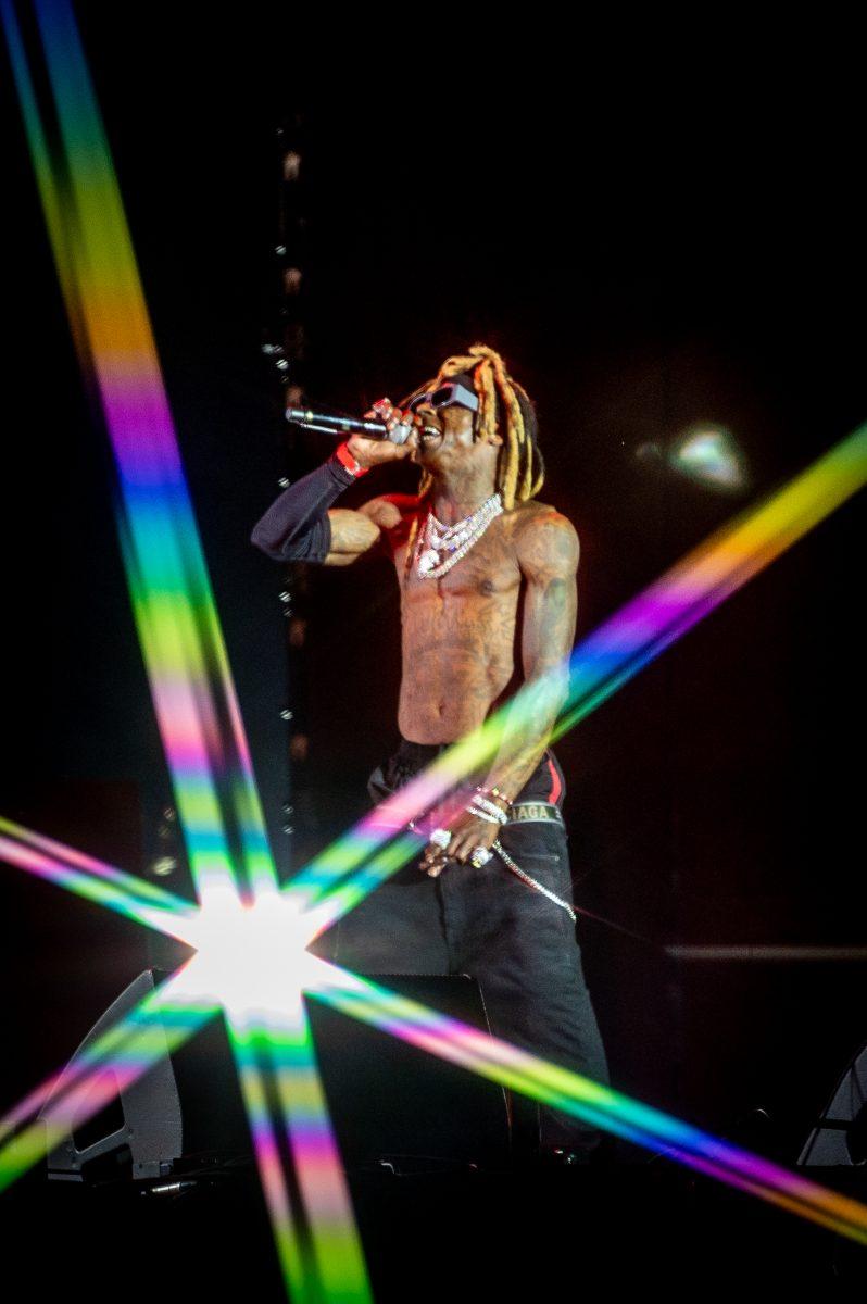Lil Wayne performs during the final Dreamville Festival in Dorothea Dix Park on April 5, 2025. Wayne wore outfits supporting North Carolina teams like the Carolina Hurricanes during his show.