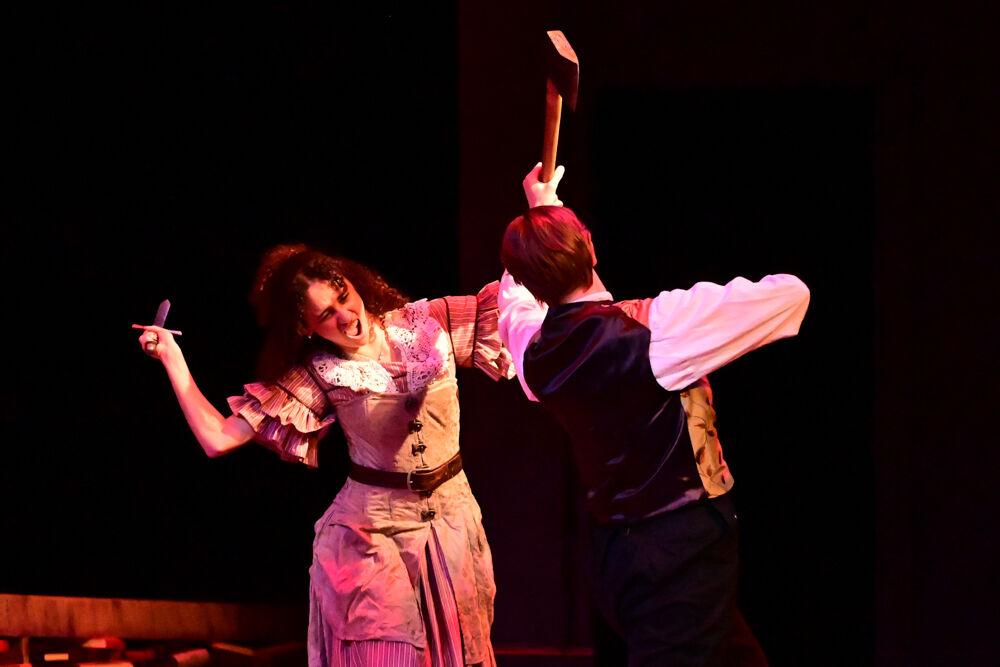 Jayla Freeman, as Cathy, fights with Dae Perry Reed, as Darcy, during the dress rehearsal performance of "You on the Moors" at Frank Thompson Hall on Wednesday, April 2, 2025. "You on the Moors Now" reimagines classic literary heroines as they explore themes of love, betrayal and independence.