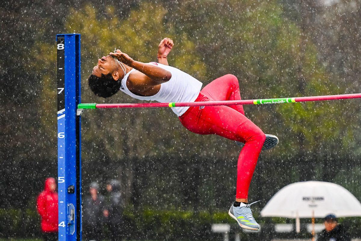 Junior jumper Kyzaiah Stone jumps over the high jump pole during the Duke Invitational at the Morris Williams Stadium on Friday, April 11, 2025. Stone tied for sixth place with a height 1.96 meters.