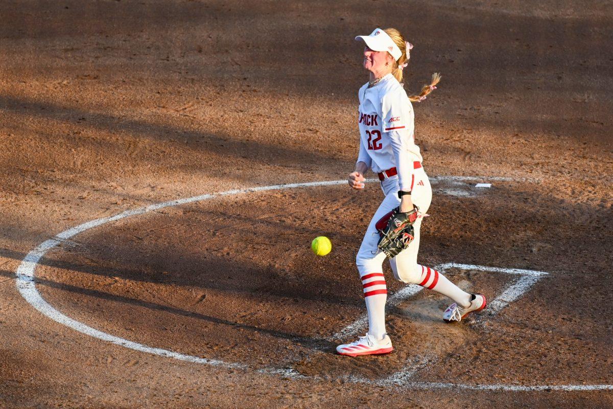 Junior pitcher Rylee Wyman hurls the ball during the game against Virginia Tech at Dail Softball Stadium on Friday, April 5, 2025. Wyman had one strikeout during the 4.2 innings she pitched. NC State lost the game 10-2.