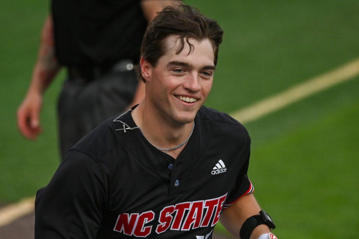 Redshirt sophomore catcher/outfielder Drew Lanphere smiles after hitting a home run during the game against Virginia on April 6, 2025 at Doak Field at Dail Park. Lanphere had hits in two at bats with one home run. NC State beat Virginia 9-8.