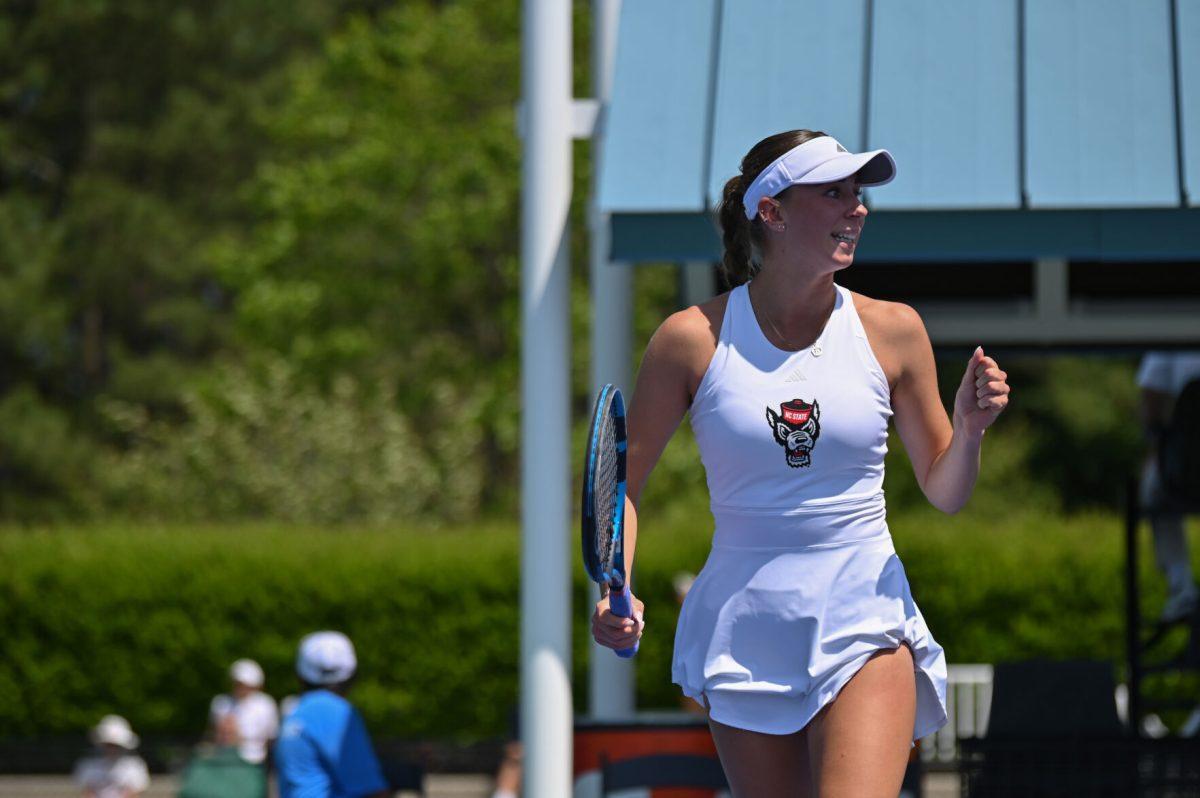 Sophomore Kristina Paskauskas smiles after winning a point during the quarterfinal match of the ACC Championship against Notre Dame at Cary Tennis Park on Friday, April 18, 2025. The Wolfpack defeated the Fighting Irish 4-1.