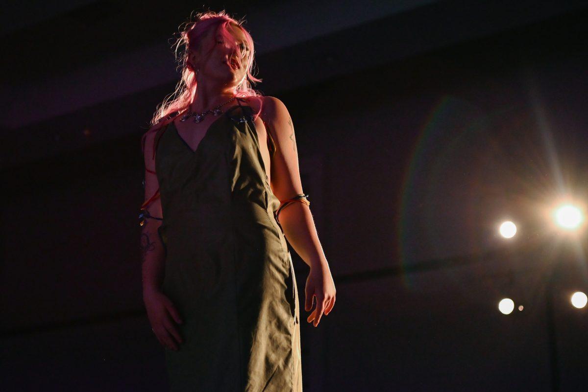 A model shows off a piece designed by Sammi Schoppe, a second-year studying fashion design, during the 27th Annual Fashion Expose at Talley Student Union on Thursday, April 10, 2025. The event was hosted by the NC State Wilson College of Textiles African American Textile Society.