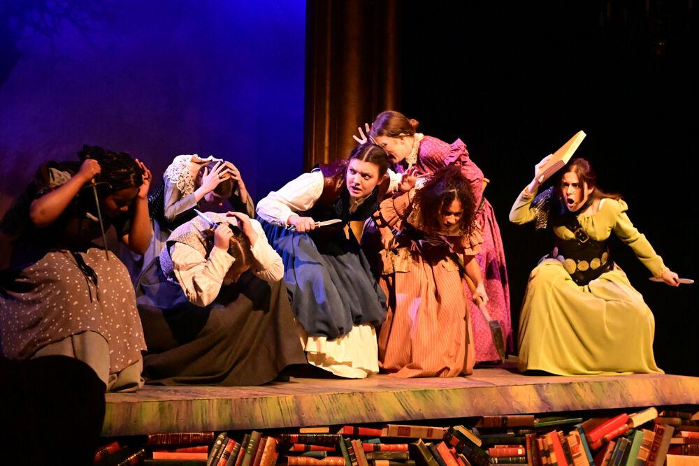 Performers crouch down in fear during the dress rehearsal performance of "You on the Moors" at Frank Thompson Hall on Wednesday, April 2, 2025. "You on the Moors Now" reimagines classic literary heroines as they explore themes of love, betrayal and independence.