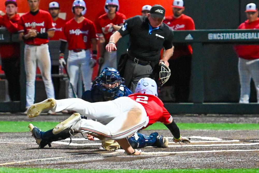 Junior outfielder Brayden Fraasman dives into home plate during the game against UNC-Greensboro&#160;on Doak Field at Dail Park on Tuesday, April 1, 2025. Fraasman hit a three-run homer. The Wolfpack defeated the Spartans 9-6.&#160;