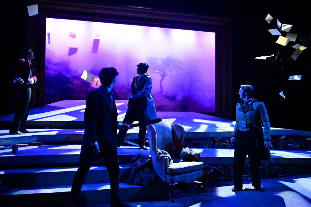 Pieces of paper fall out of the air during the dress rehearsal performance of "You on the Moors" at Frank Thompson Hall on Wednesday, April 2, 2025. "You on the Moors Now" reimagines classic literary heroines as they explore themes of love, betrayal and independence.