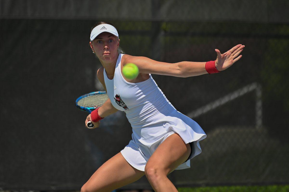 Freshman Gabis Paskauskas prepares to forehand the ball during the quarterfinal match of the ACC Championship against Notre Dame at Cary Tennis Park on Friday, April 18, 2025. Paskauskas won her singles match 2-0. The Wolfpack defeated the Fighting Irish 4-1.